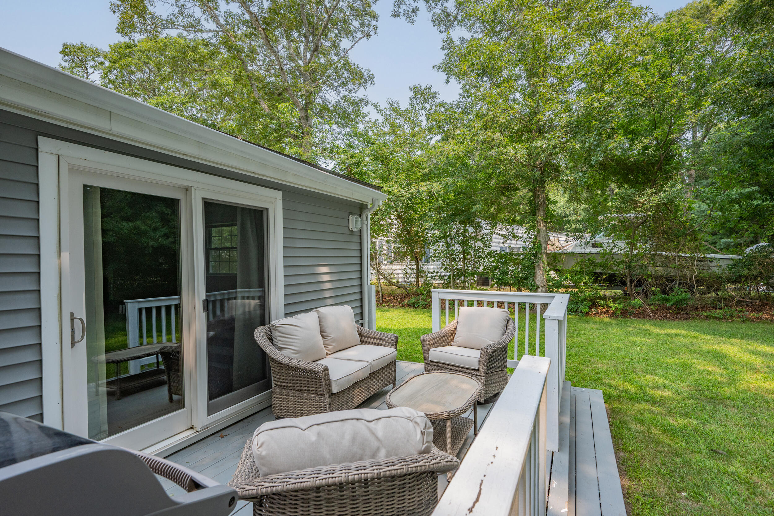 40 Red Lily Pond Road Centerville, MA 02632 - Photo 19 of 25 a view of backyard with seating space and trees
