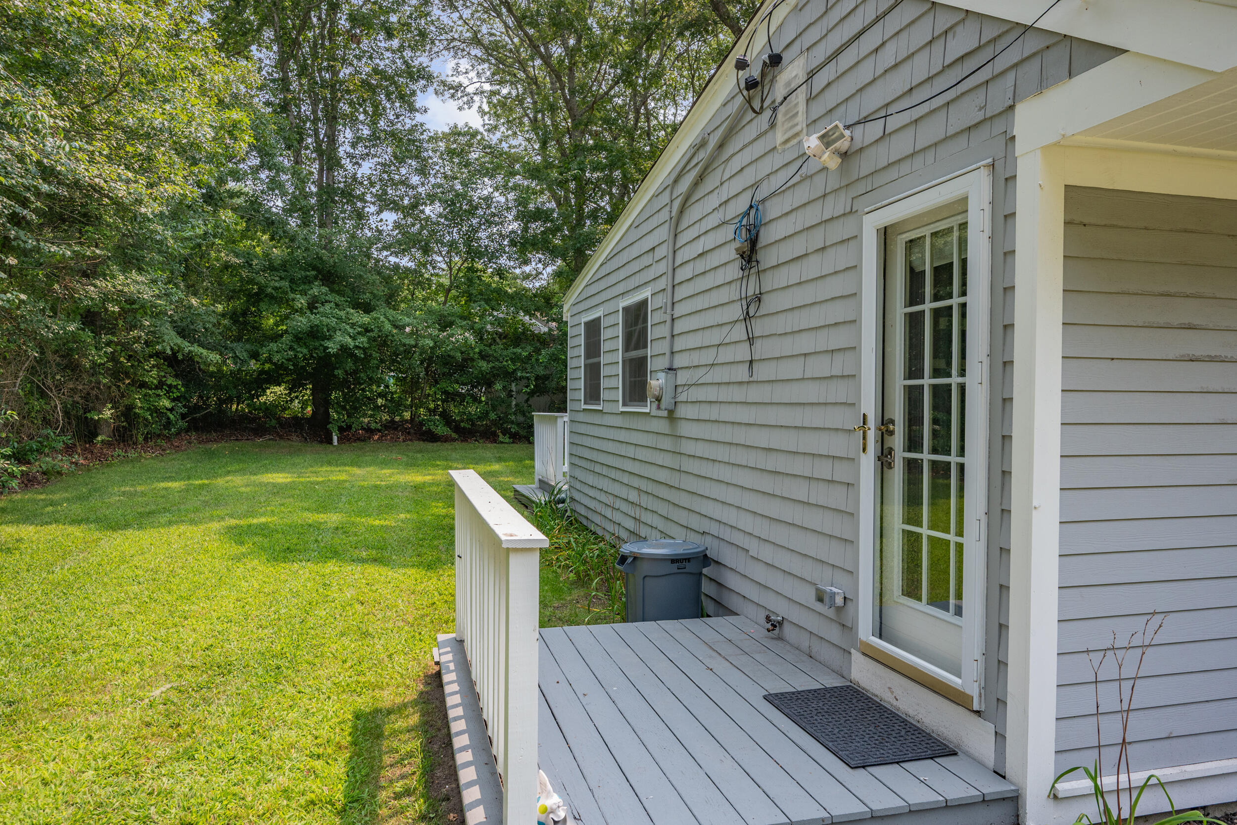 40 Red Lily Pond Road Centerville, MA 02632 - Photo 22 of 25 a view of a house with backyard