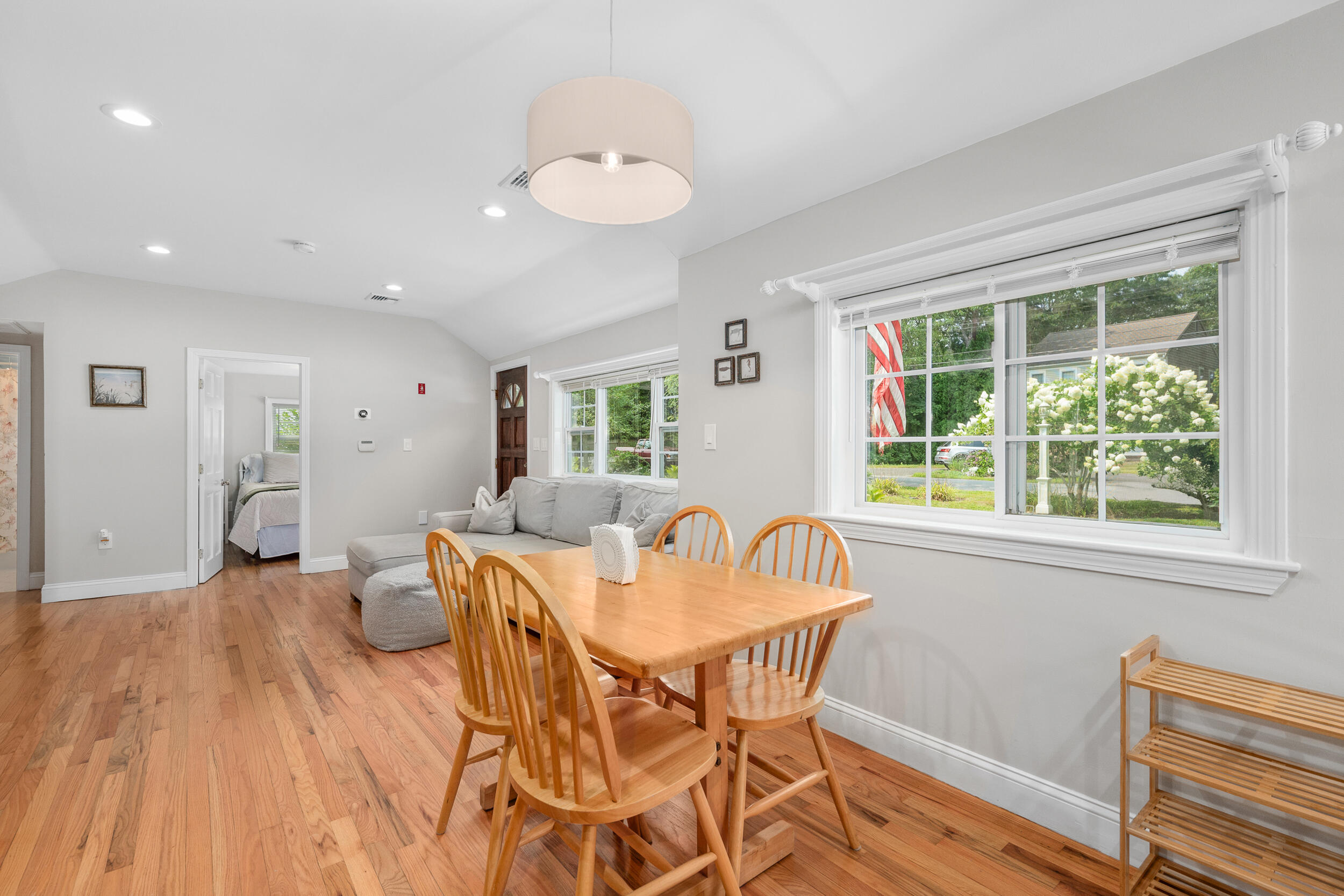 40 Red Lily Pond Road Centerville, MA 02632 - Photo 10 of 25 a dining room with furniture and wooden floor