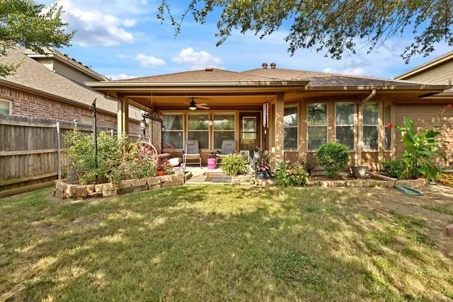 front view of a building with a garden