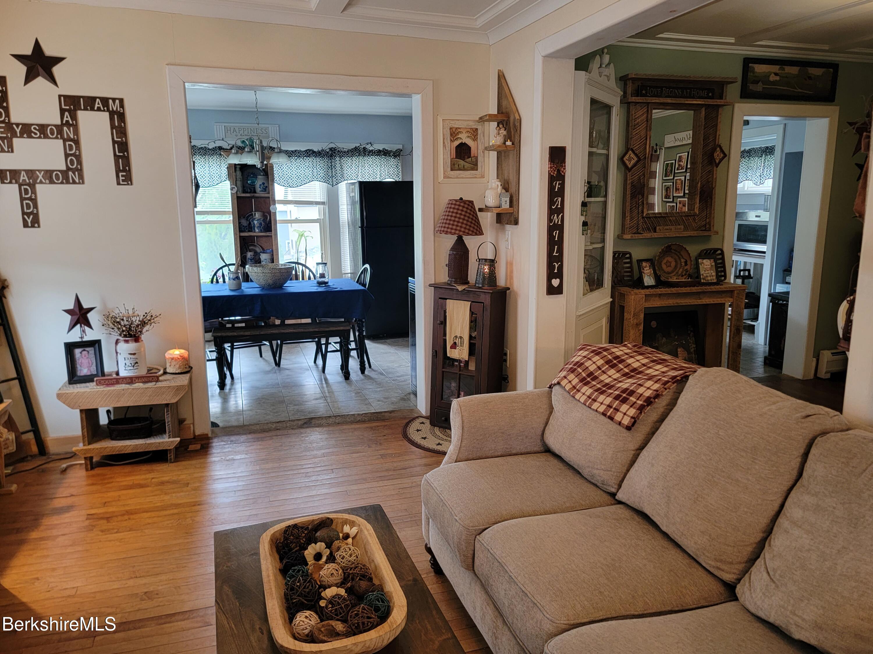 70 Frederick Street North Adams, MA 01247 - Photo 12 of 37 a living room with furniture and a fireplace