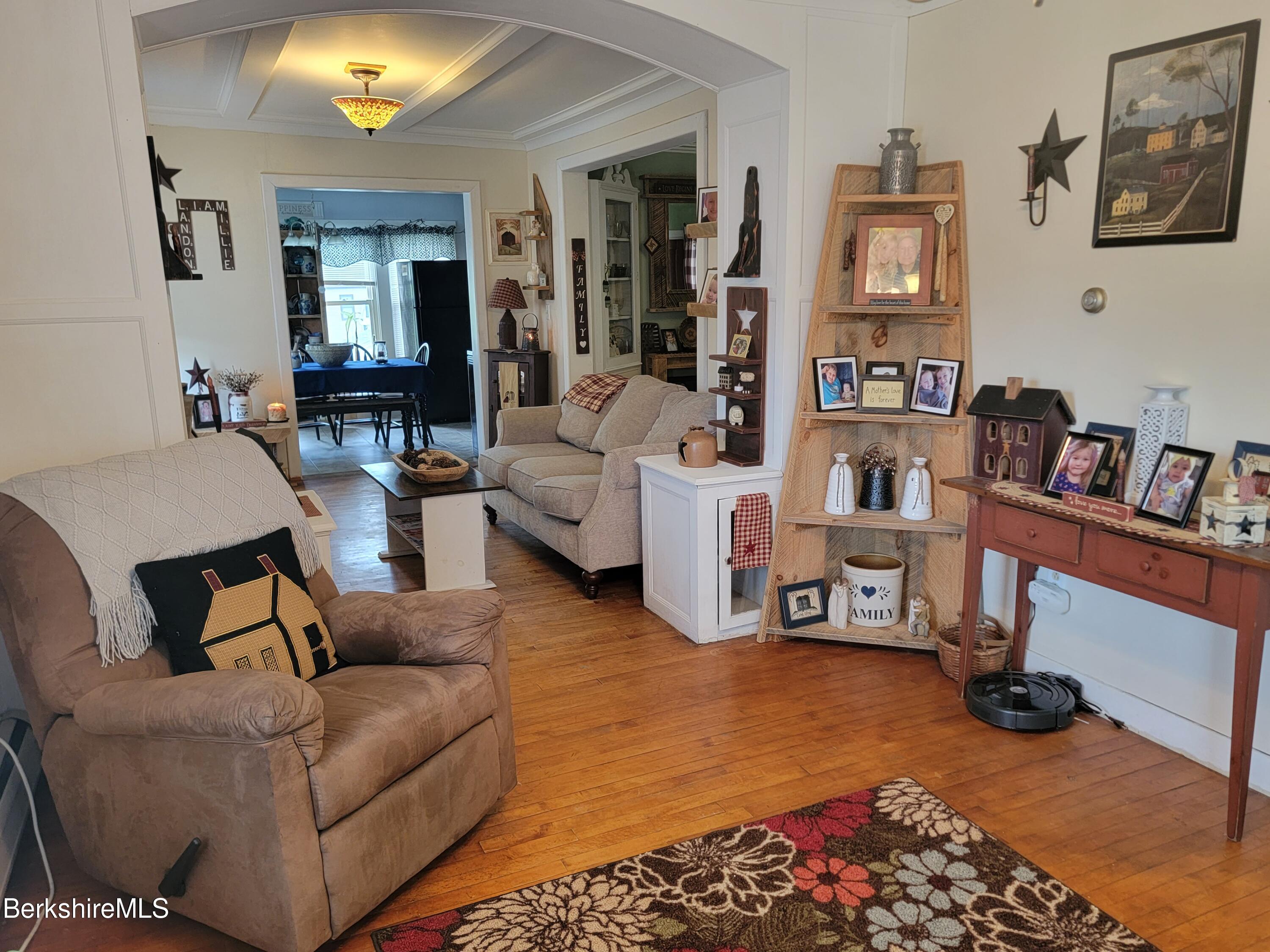 70 Frederick Street North Adams, MA 01247 - Photo 13 of 37 a living room with furniture and a rug