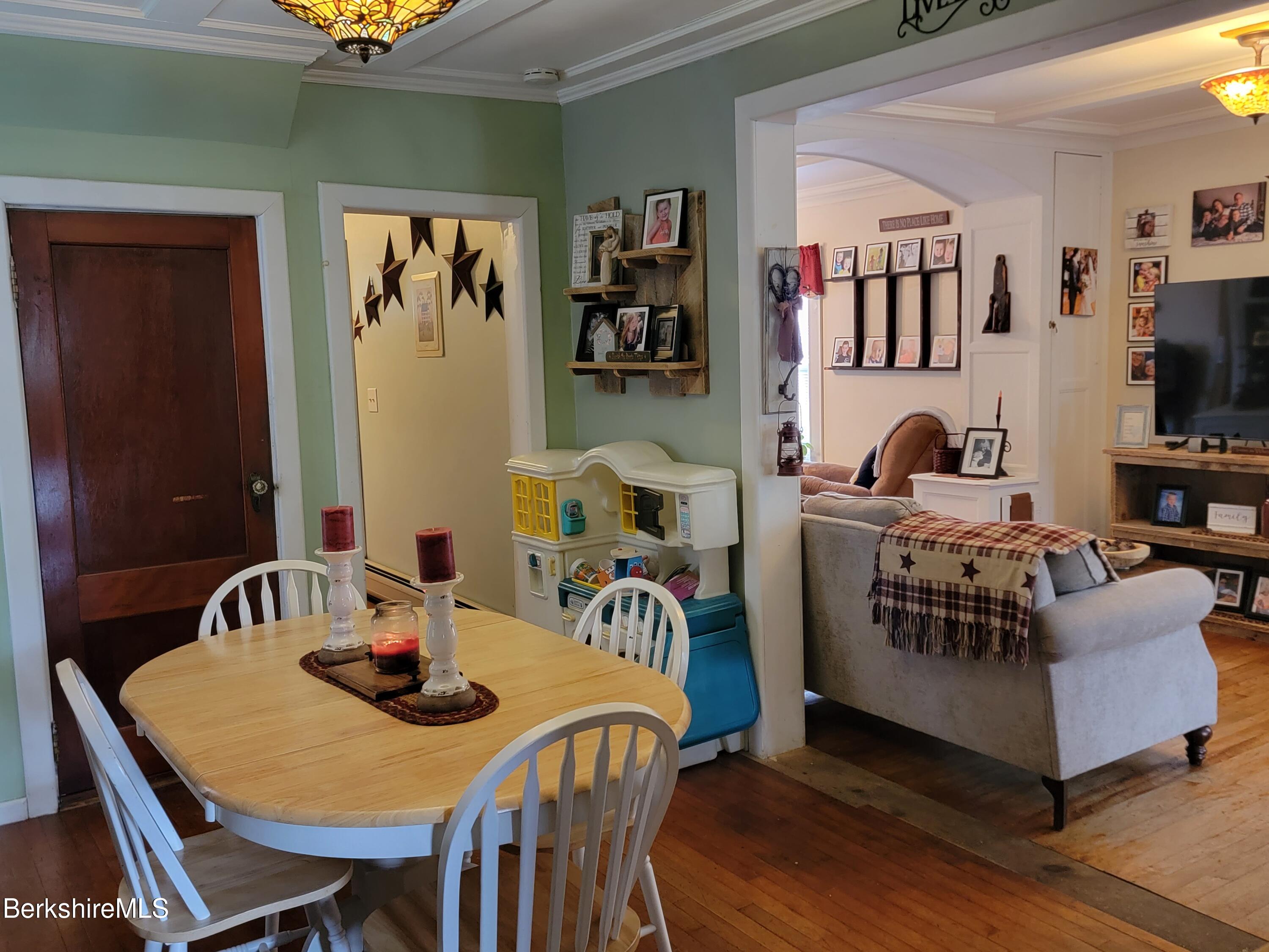 70 Frederick Street North Adams, MA 01247 - Photo 16 of 37 a bedroom with furniture and a flat screen tv