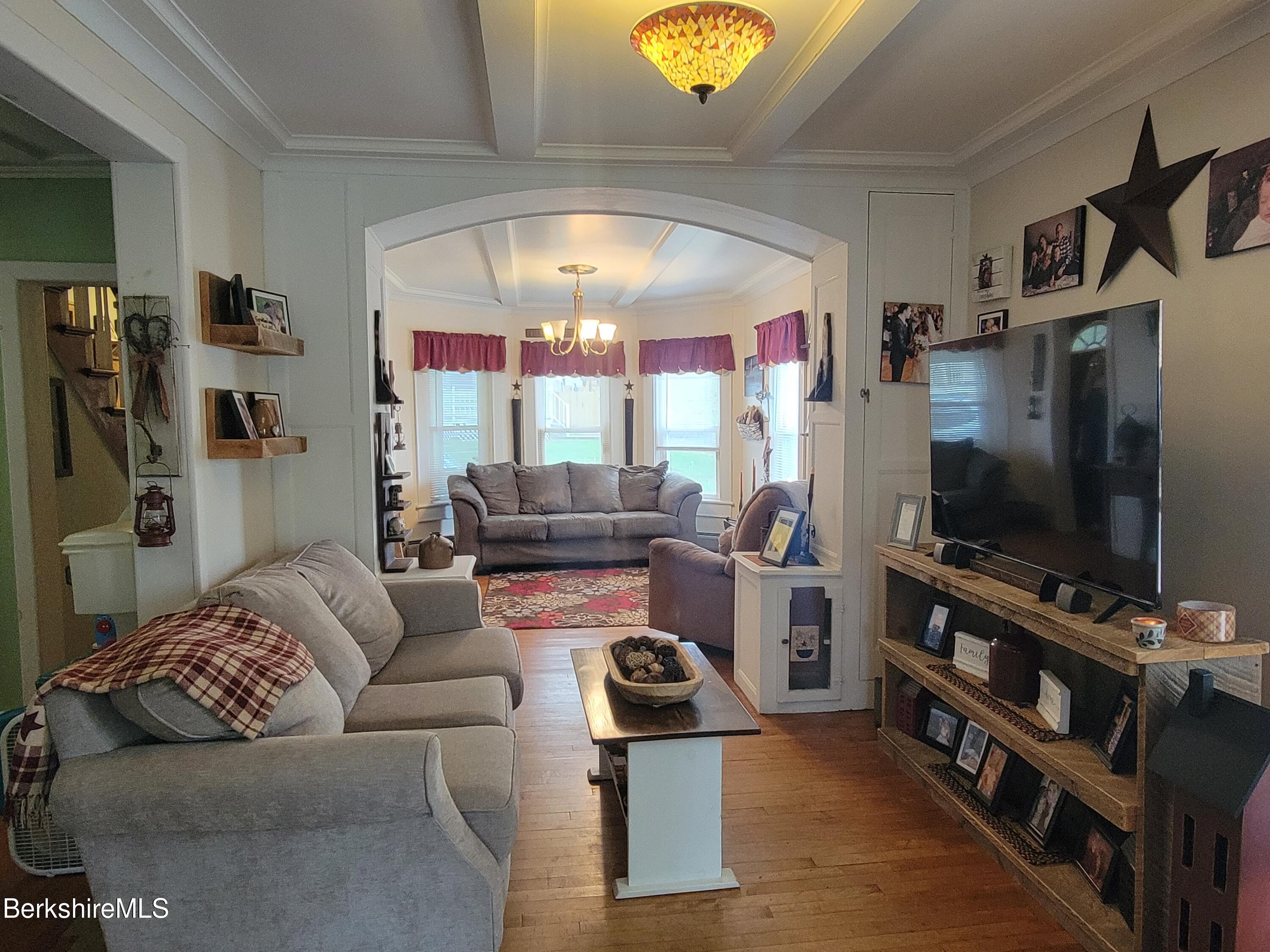 70 Frederick Street North Adams, MA 01247 - Photo 17 of 37 a living room with furniture and a flat screen tv