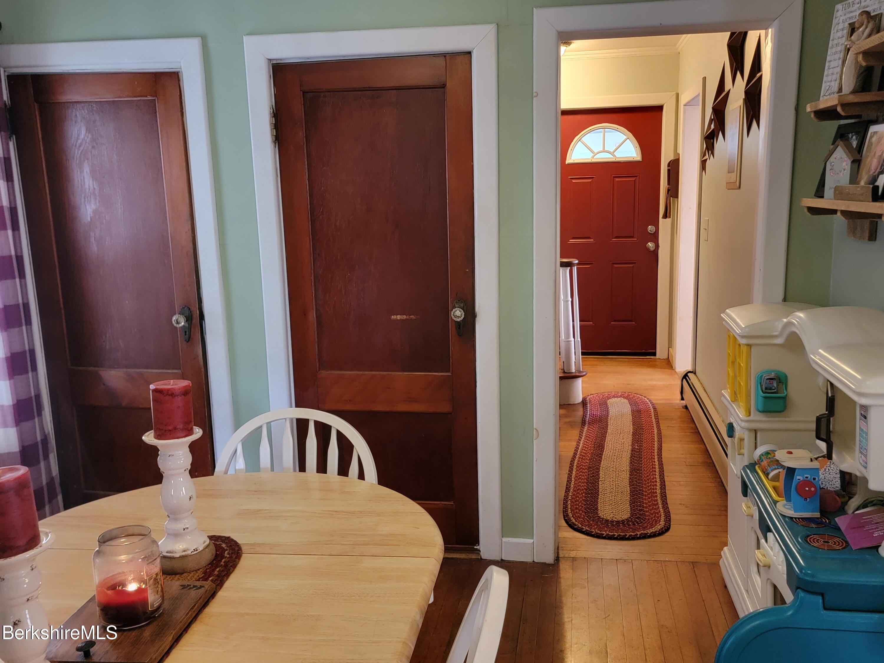 70 Frederick Street North Adams, MA 01247 - Photo 22 of 37 a bedroom with bed and a mirror