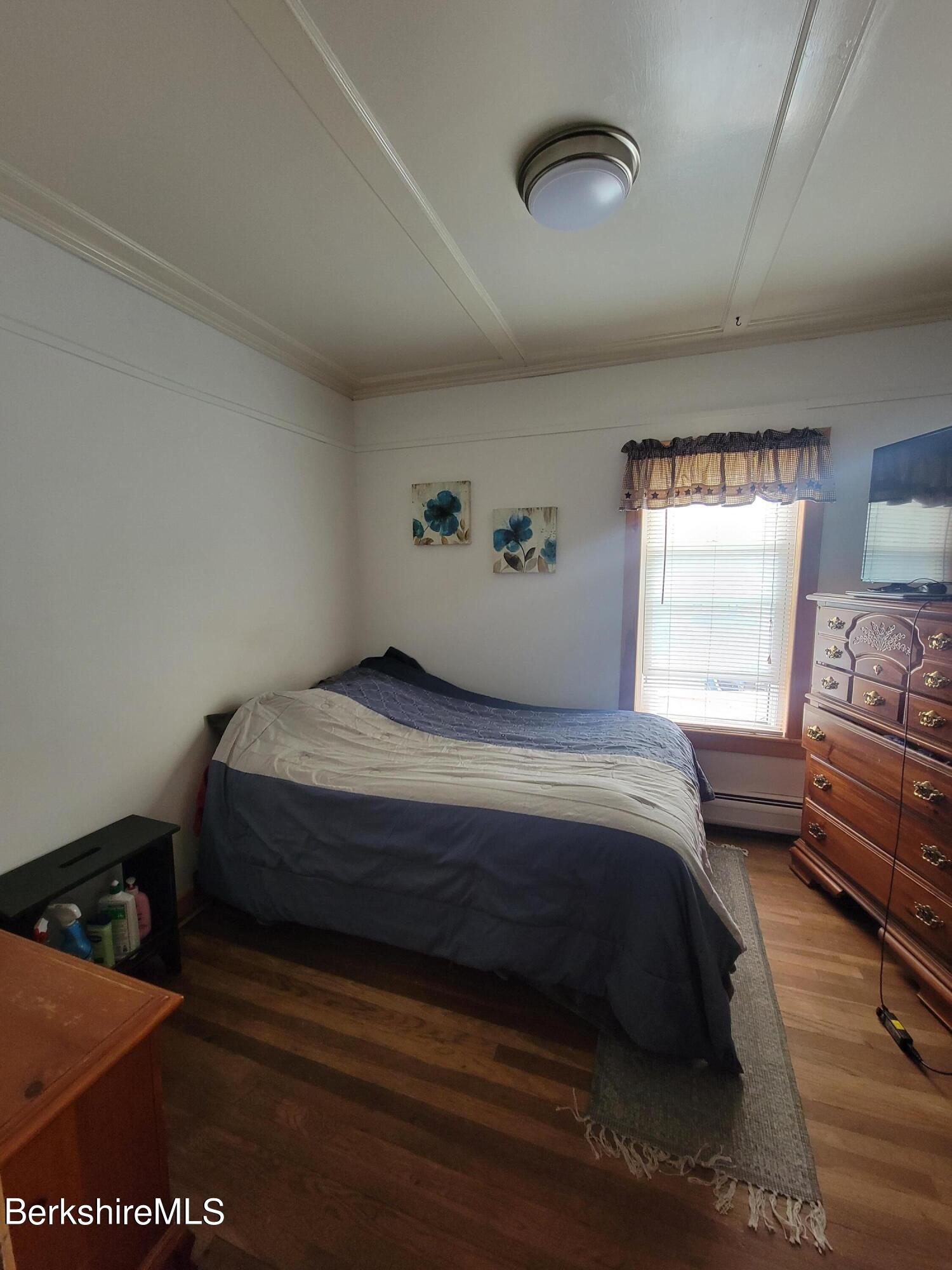 70 Frederick Street North Adams, MA 01247 - Photo 28 of 37 a bedroom with a bed and window