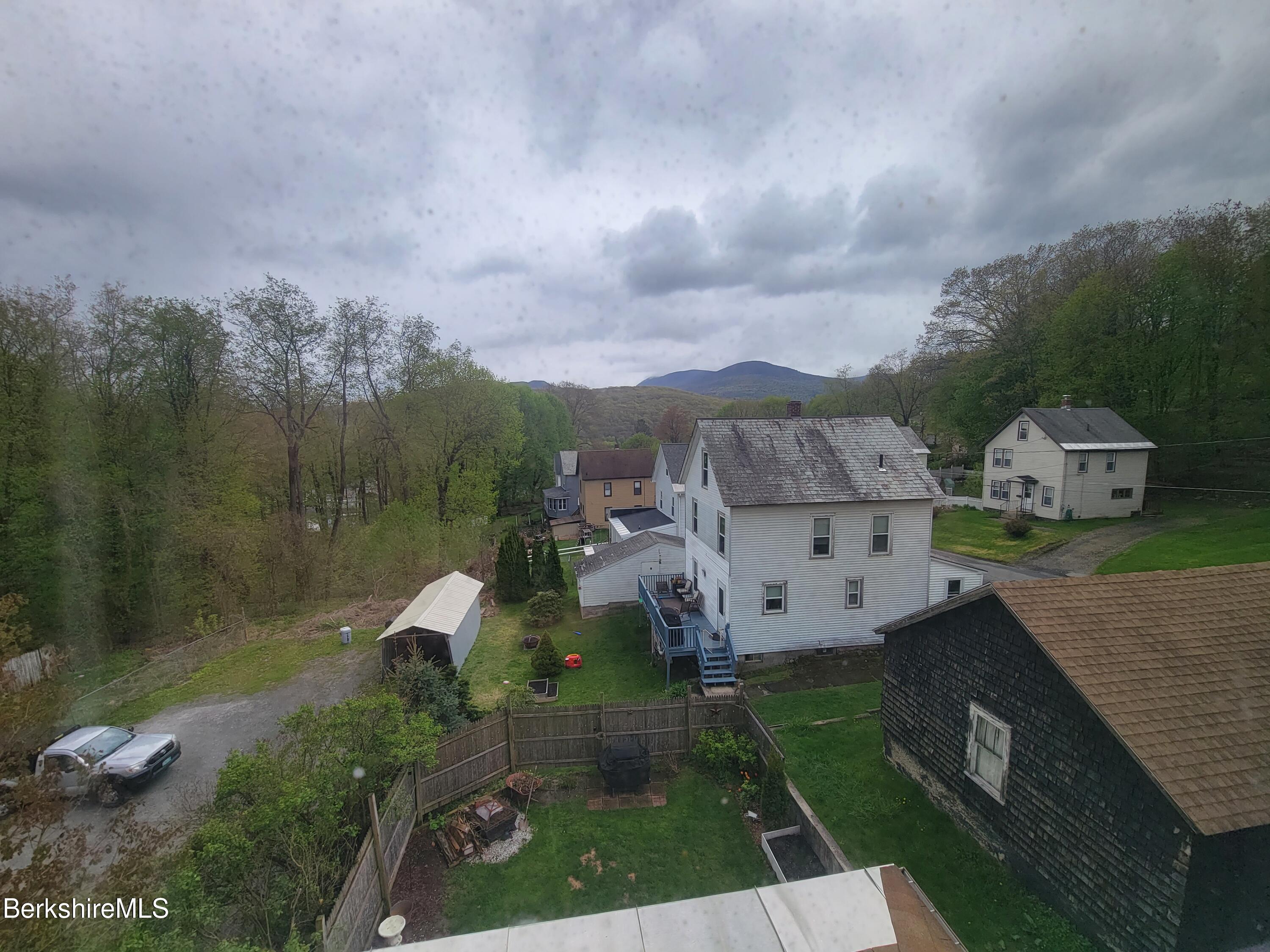 70 Frederick Street North Adams, MA 01247 - Photo 34 of 37 an aerial view of a house with garden space and street view