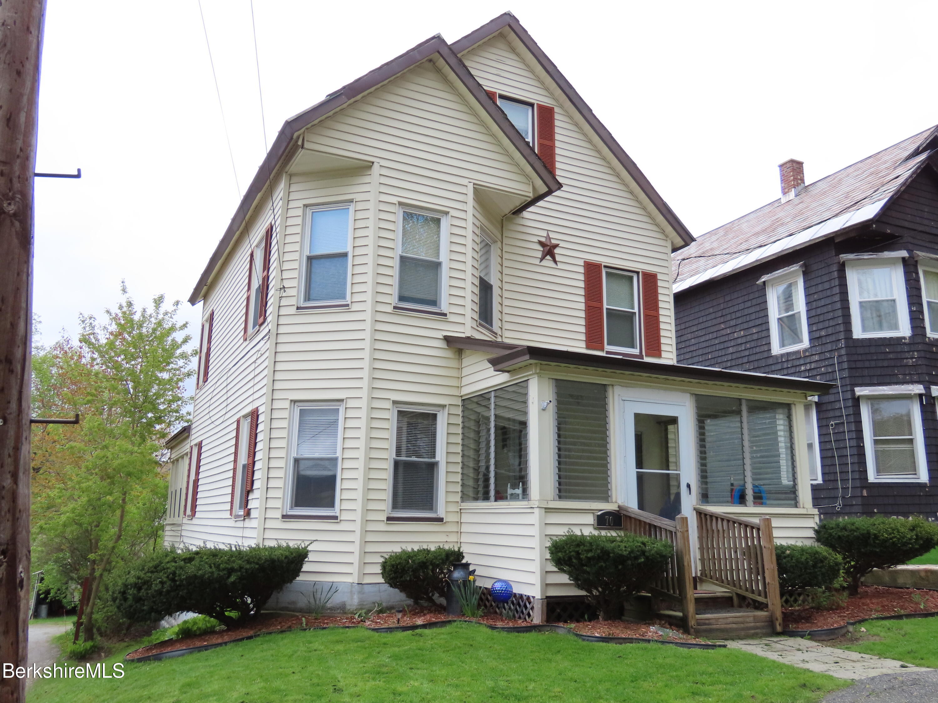 70 Frederick Street North Adams, MA 01247 - Photo 36 of 37 a front view of house with yard and green space
