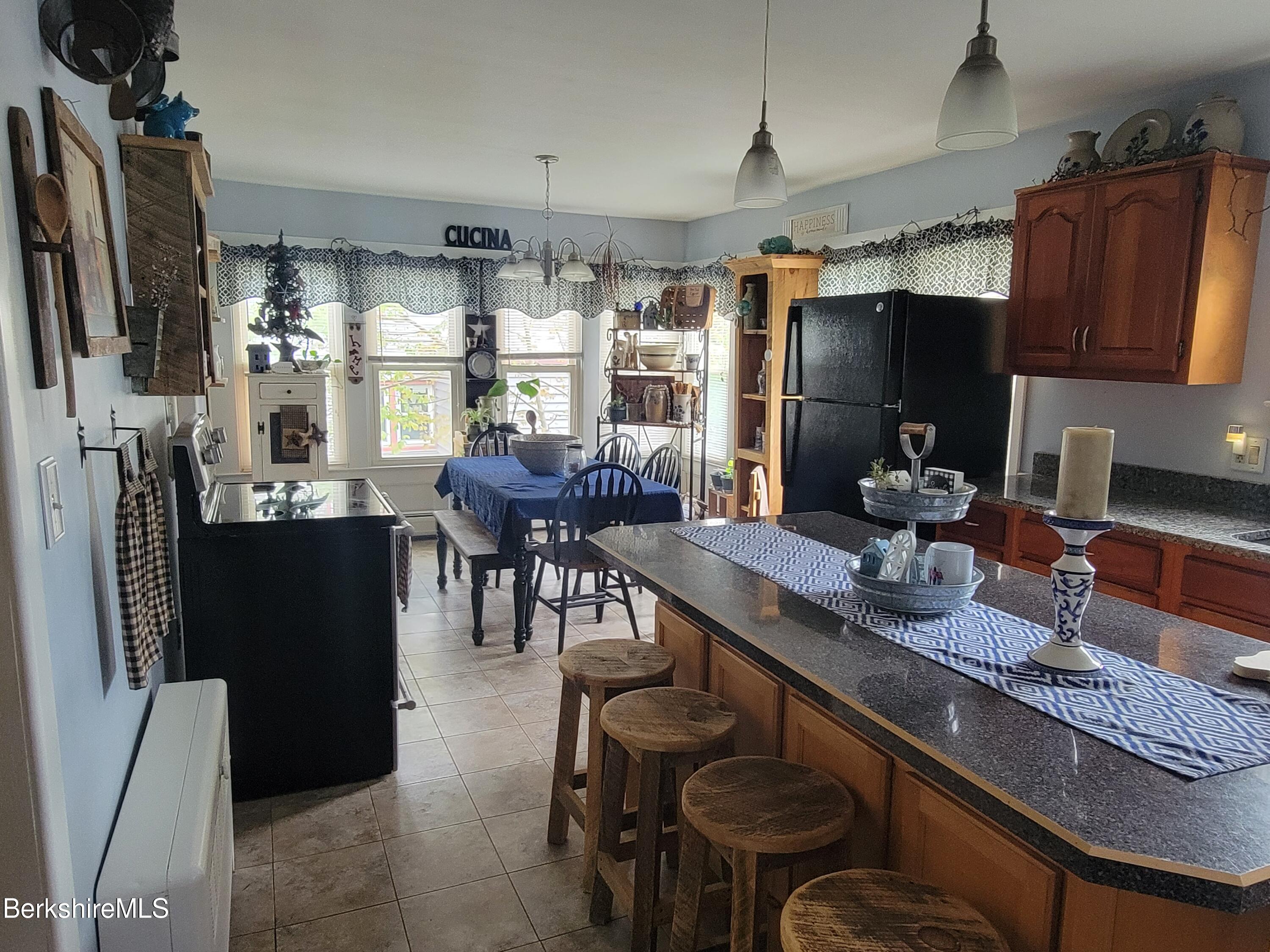70 Frederick Street North Adams, MA 01247 - Photo 8 of 37 a kitchen with granite countertop lots of counter top space and furniture