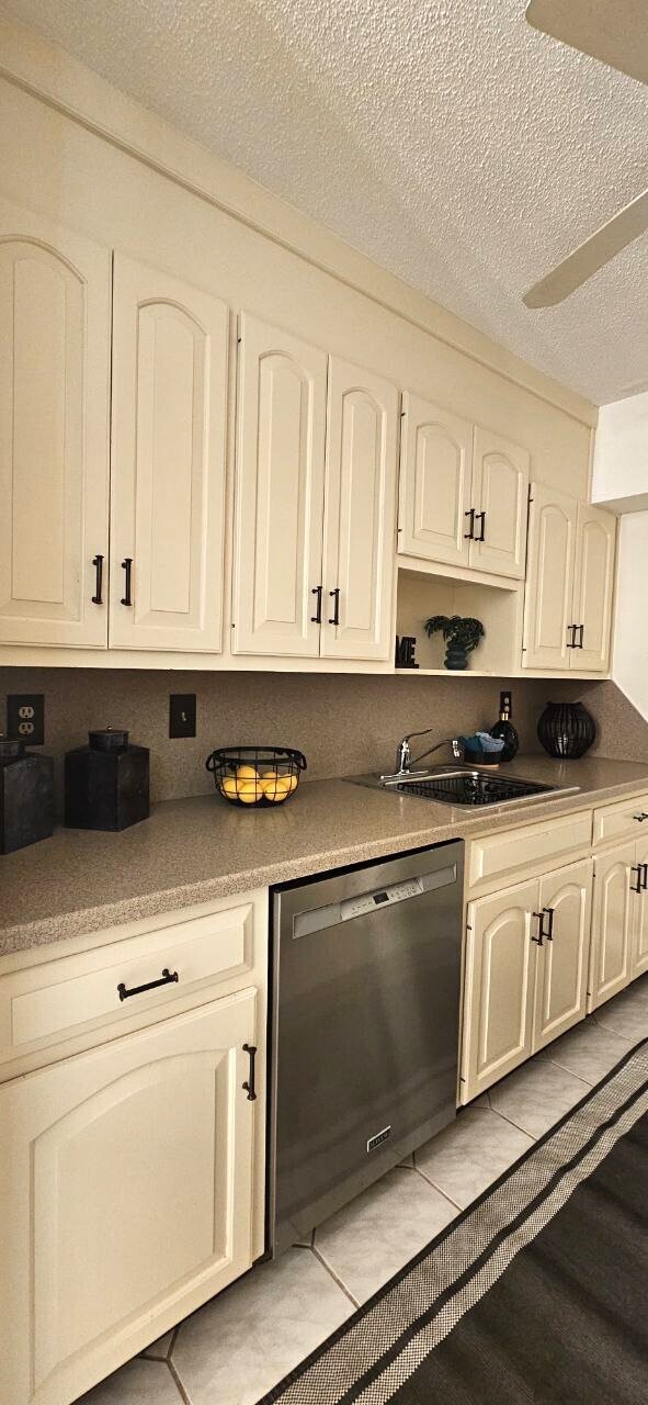 25 Washington Street, Unit 22 Bristol, CT 06010 - Photo 11 of 40 a kitchen with stainless steel appliances granite countertop white cabinets sink and granite counter tops