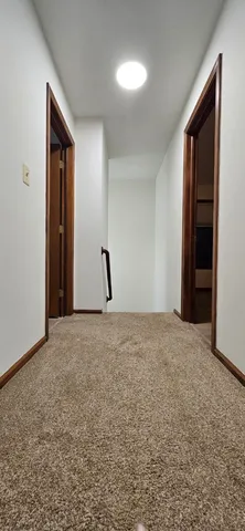 a view of empty room with front door