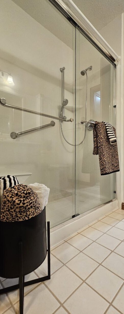 25 Washington Street, Unit 22 Bristol, CT 06010 - Photo 26 of 40 a bathroom with a bathtub and a shower