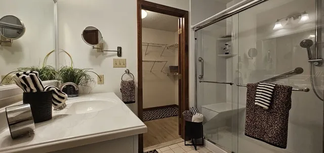 a kitchen with a refrigerator and a sink