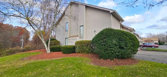 a view of a back yard of the house