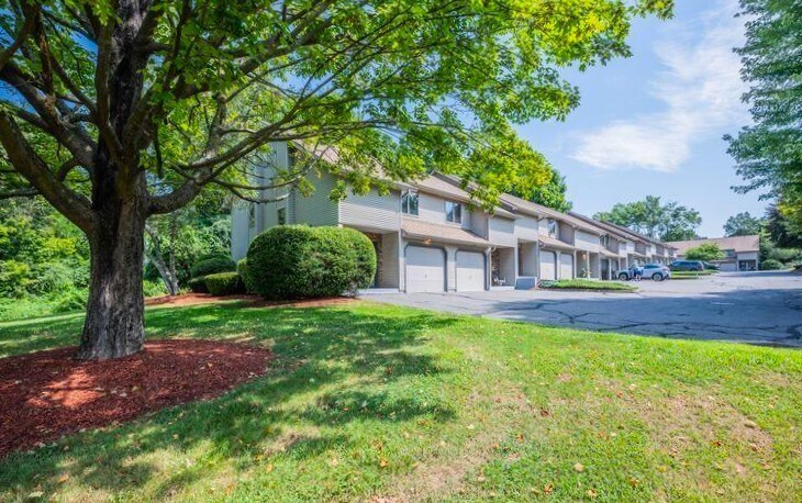 25 Washington Street, Unit 22 Bristol, CT 06010 - Photo 40 of 40 a front view of a house with garden