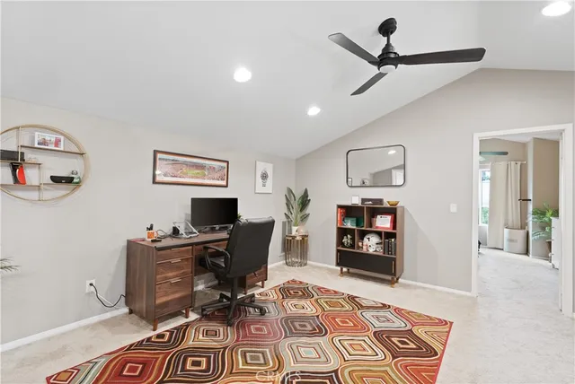 a workspace with furniture and window