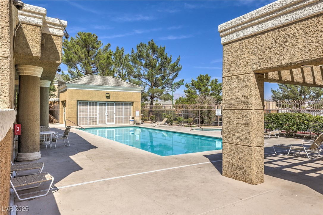 8070 West Russell Road, Unit 2032 Las Vegas, NV 89113 - Photo 23 of 29 Community pool featuring a patio area