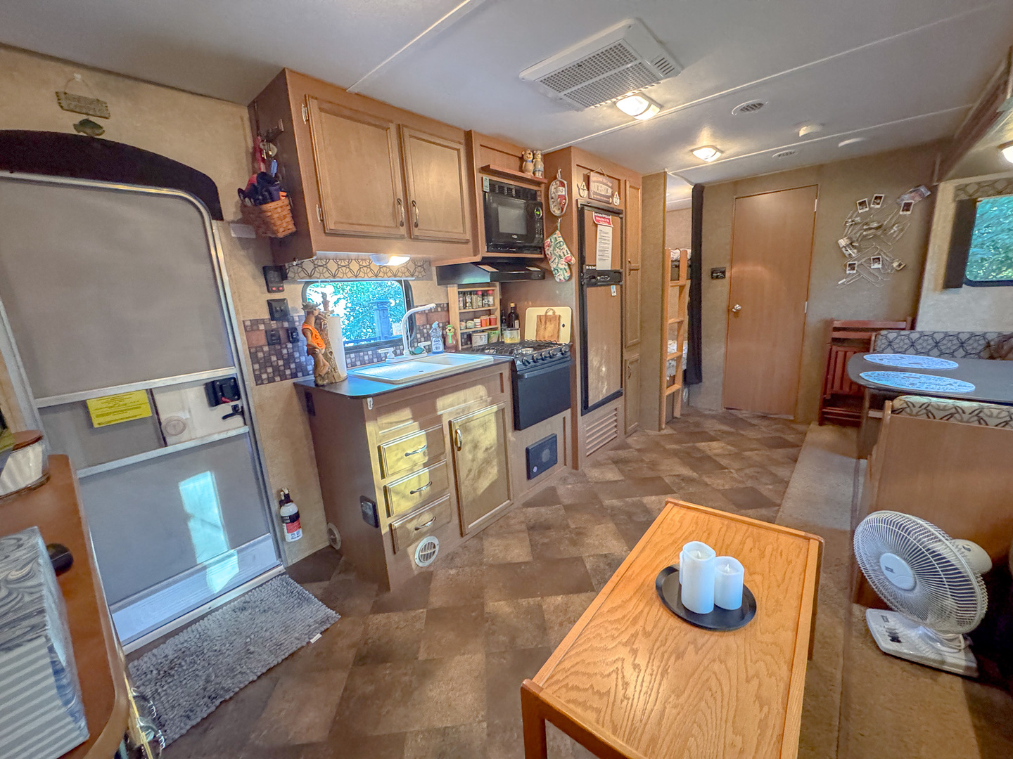 9-46 Woodhaven Sublette, IL 61367 - Photo 11 of 18 a kitchen with stainless steel appliances granite countertop a refrigerator a stove and a wooden cabinets