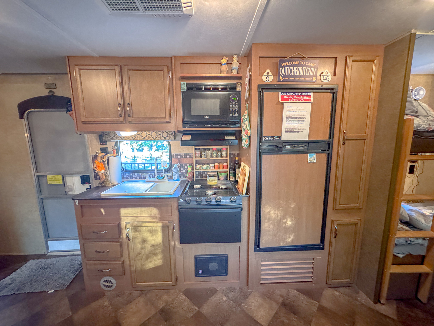 9-46 Woodhaven Sublette, IL 61367 - Photo 12 of 18 a kitchen with a refrigerator and a stove