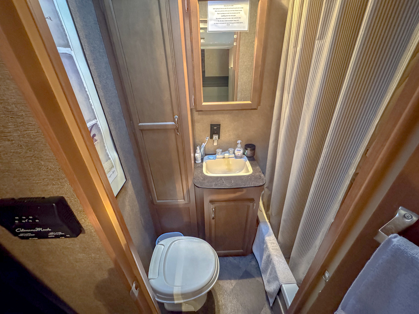9-46 Woodhaven Sublette, IL 61367 - Photo 18 of 18 a bathroom with a sink a toilet a tub and a window