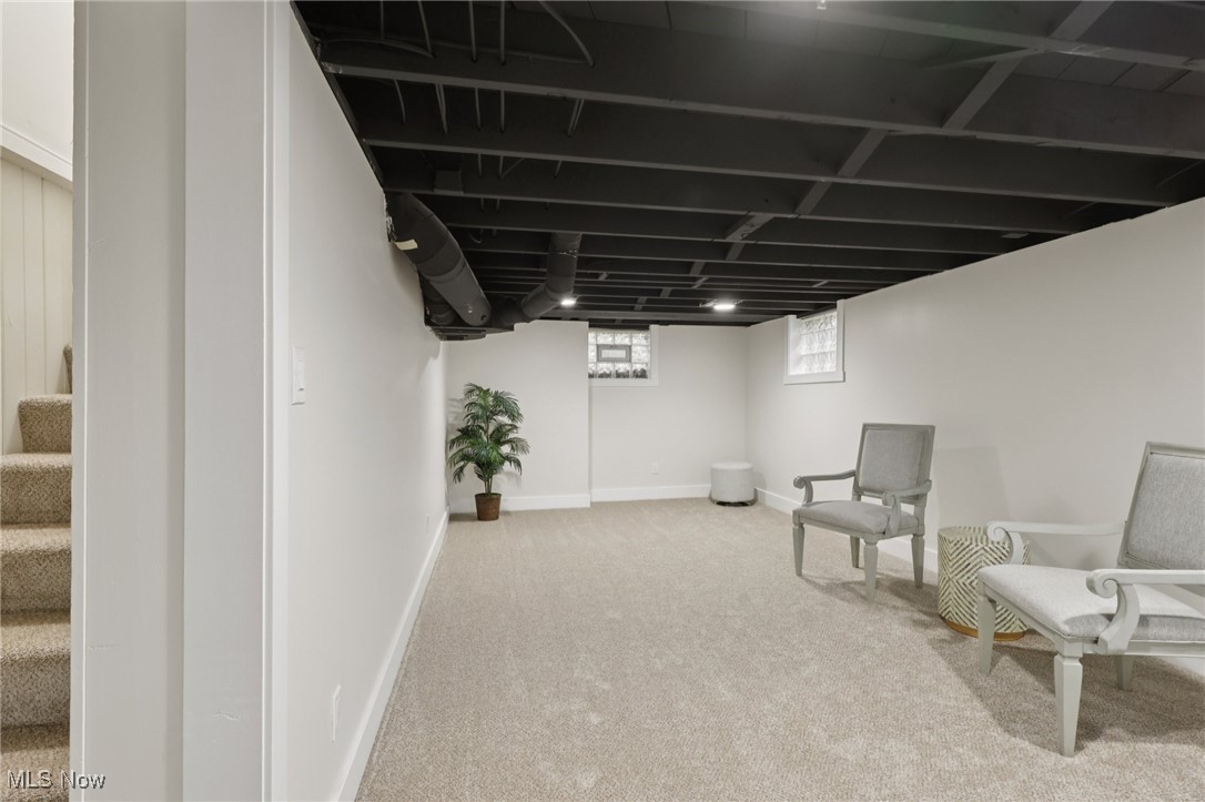 548 Spring Street Wooster, OH 44691 - Photo 32 of 45 Sitting room featuring stairs and light colored carpet