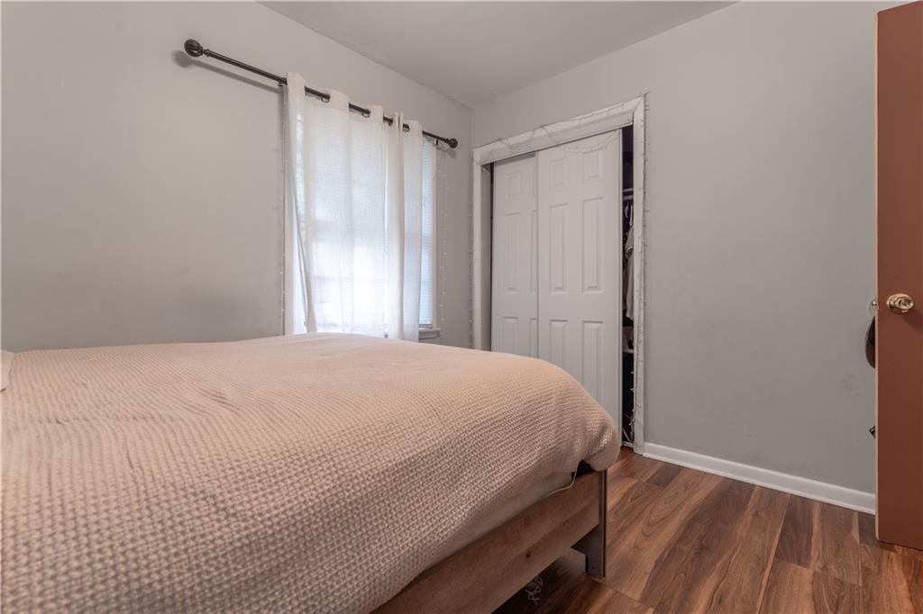 3554 Pine Street Atlanta, GA 30340 - Photo 11 of 21 a bedroom with a bed and a window