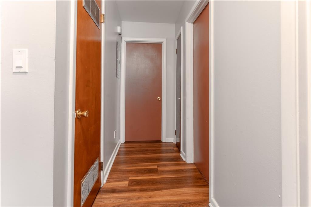 3554 Pine Street Atlanta, GA 30340 - Photo 13 of 21 a view of a hallway with wooden floor