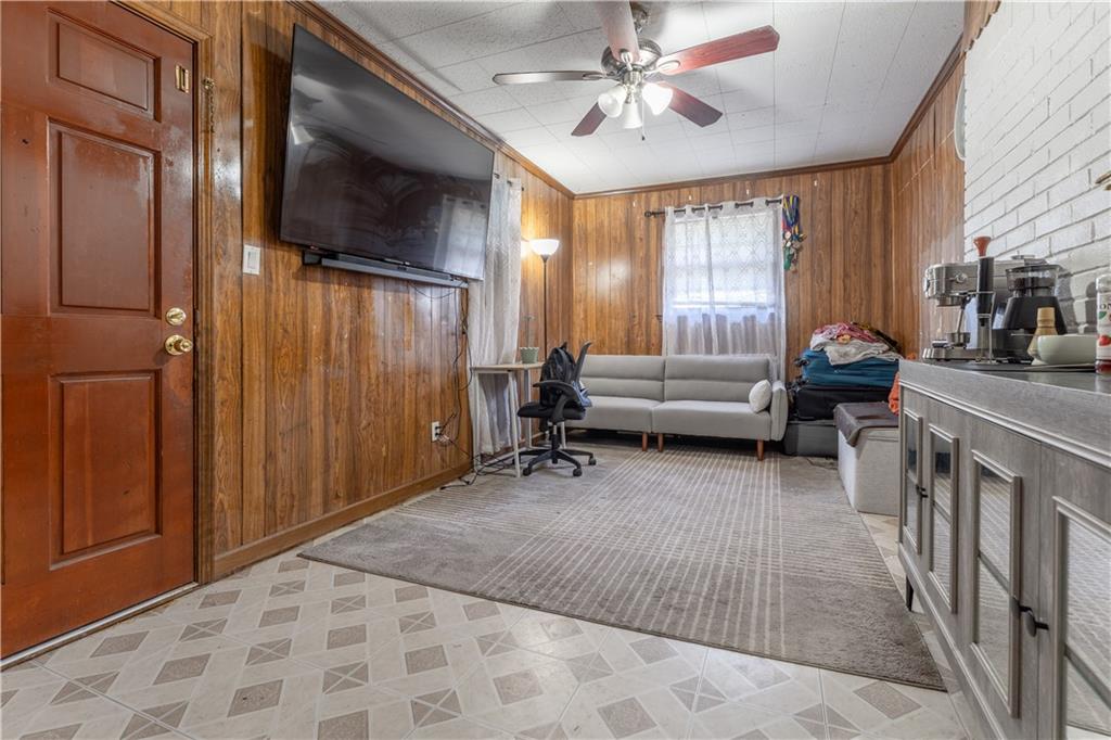 3554 Pine Street Atlanta, GA 30340 - Photo 18 of 21 a living room with furniture and a flat screen tv
