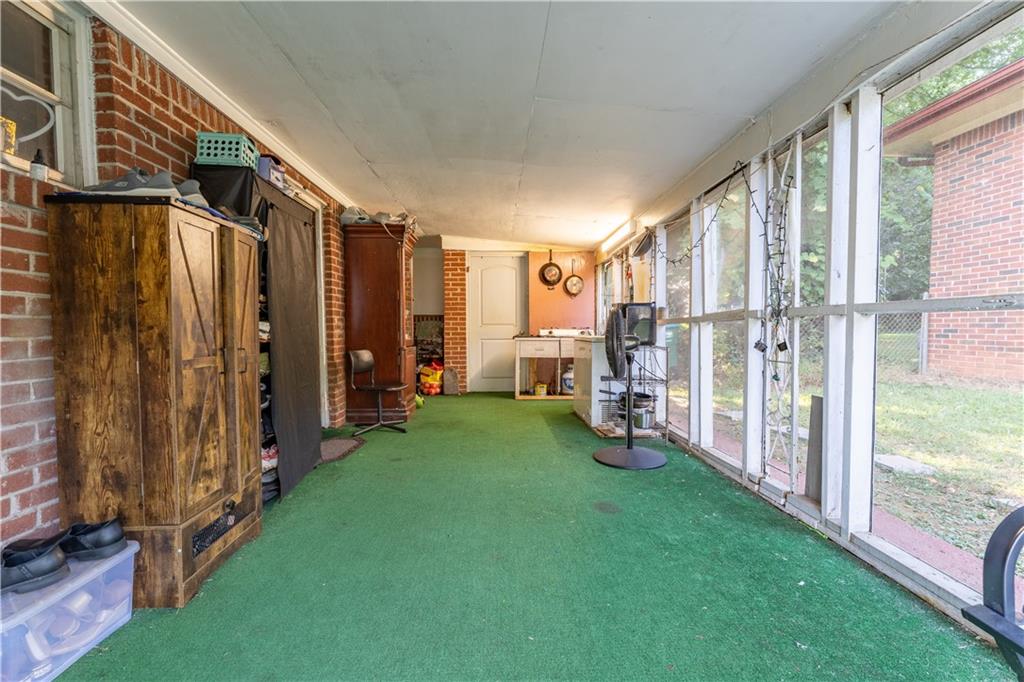 3554 Pine Street Atlanta, GA 30340 - Photo 19 of 21 a view of a porch with chairs and backyard