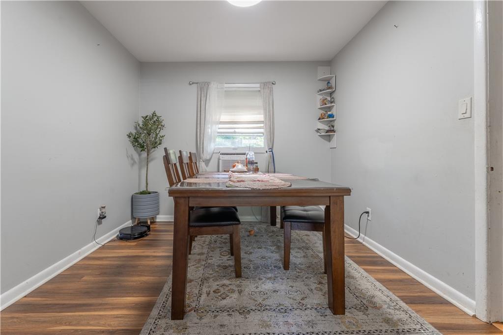 3554 Pine Street Atlanta, GA 30340 - Photo 4 of 21 a dining room with furniture and window