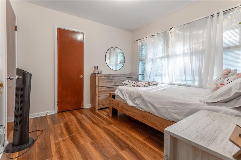 3554 Pine Street Atlanta, GA 30340 - Photo 7 of 21 a bedroom with a bed and a closet