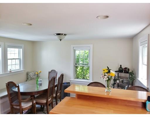 49 Weyham Road Weymouth, MA 02191 - Photo 11 of 36 a view of a dining room with furniture window and outside view