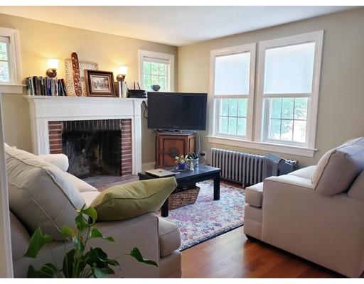 49 Weyham Road Weymouth, MA 02191 - Photo 13 of 36 a living room with furniture and a fireplace