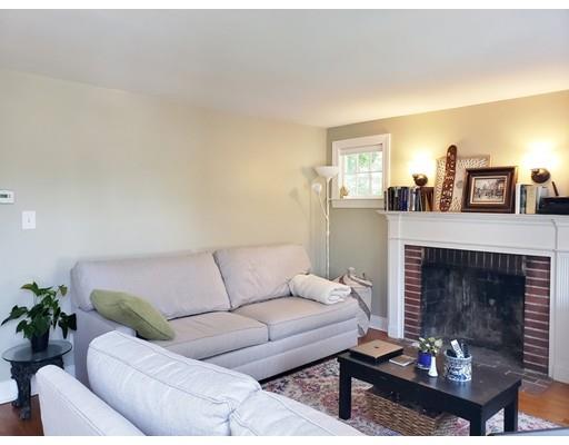 49 Weyham Road Weymouth, MA 02191 - Photo 14 of 36 a living room with furniture and a fireplace