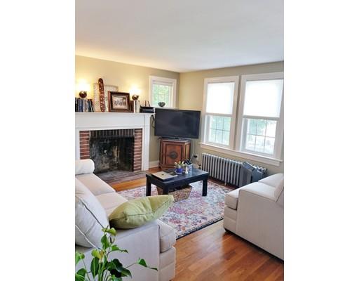 49 Weyham Road Weymouth, MA 02191 - Photo 15 of 36 a living room with furniture and a fireplace