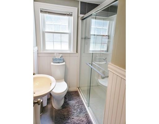 49 Weyham Road Weymouth, MA 02191 - Photo 23 of 36 a bathroom with a toilet a sink and a window