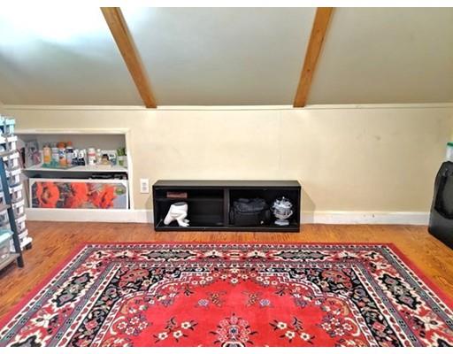 49 Weyham Road Weymouth, MA 02191 - Photo 26 of 36 a view of a living room and a rug