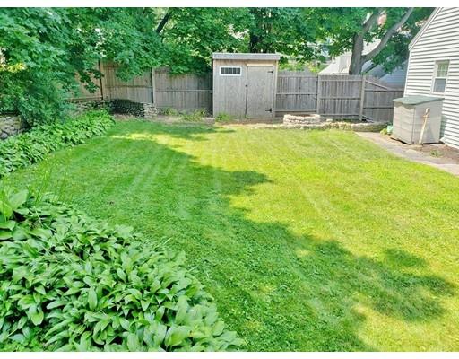 49 Weyham Road Weymouth, MA 02191 - Photo 35 of 36 a swimming pool with wooden fence
