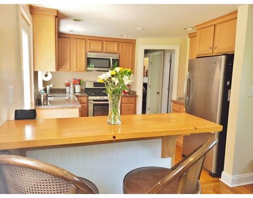 49 Weyham Road Weymouth, MA 02191 - Photo 10 of 36 a kitchen with a refrigerator and countertop