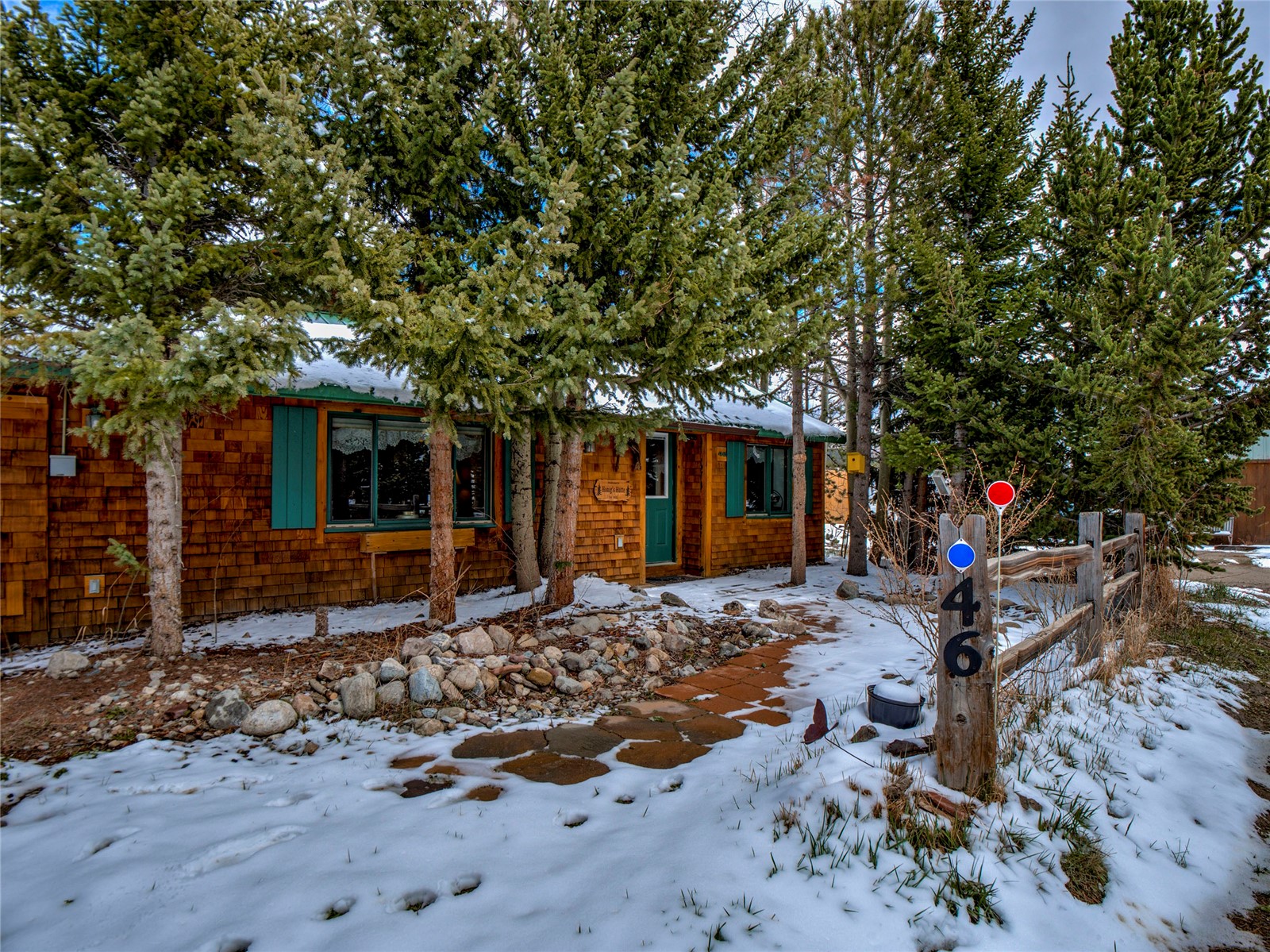 46 Singleton Road Alma, CO 80420 - Photo 2 of 50 a front view of a house with a tree