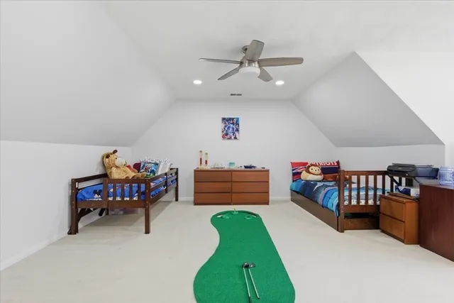 a bedroom with furniture and a bed