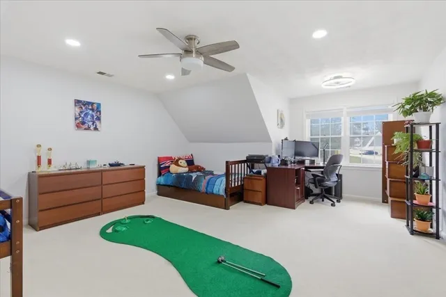 a bed room with furniture and a window