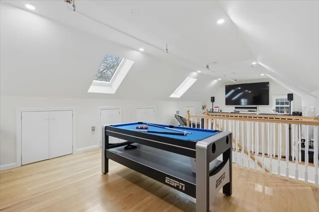 a room with furniture and a flat screen tv