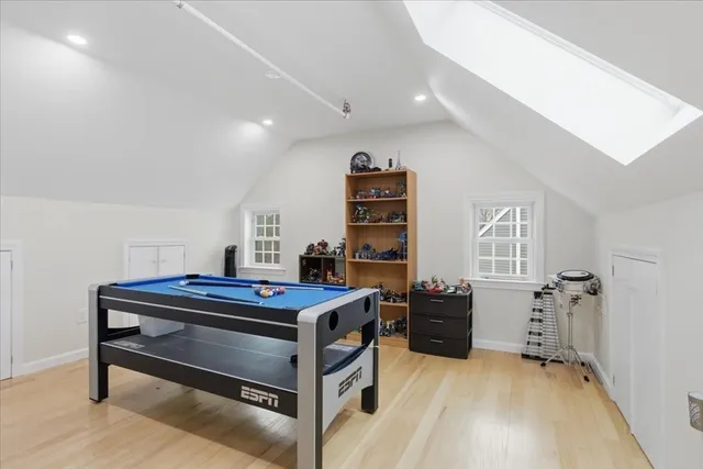 a bedroom with a bed and a desk