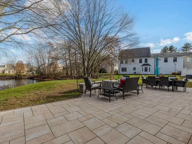a view of a outdoor space with furniture and garden