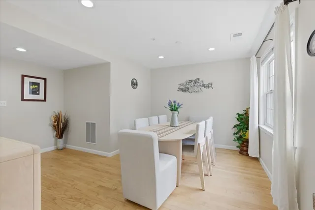 a view of a dining room with furniture