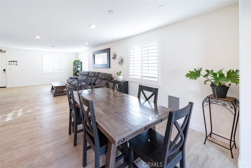 32078 Rambling Court Winchester, CA 92596 - Photo 15 of 48 a view of a dining room with furniture