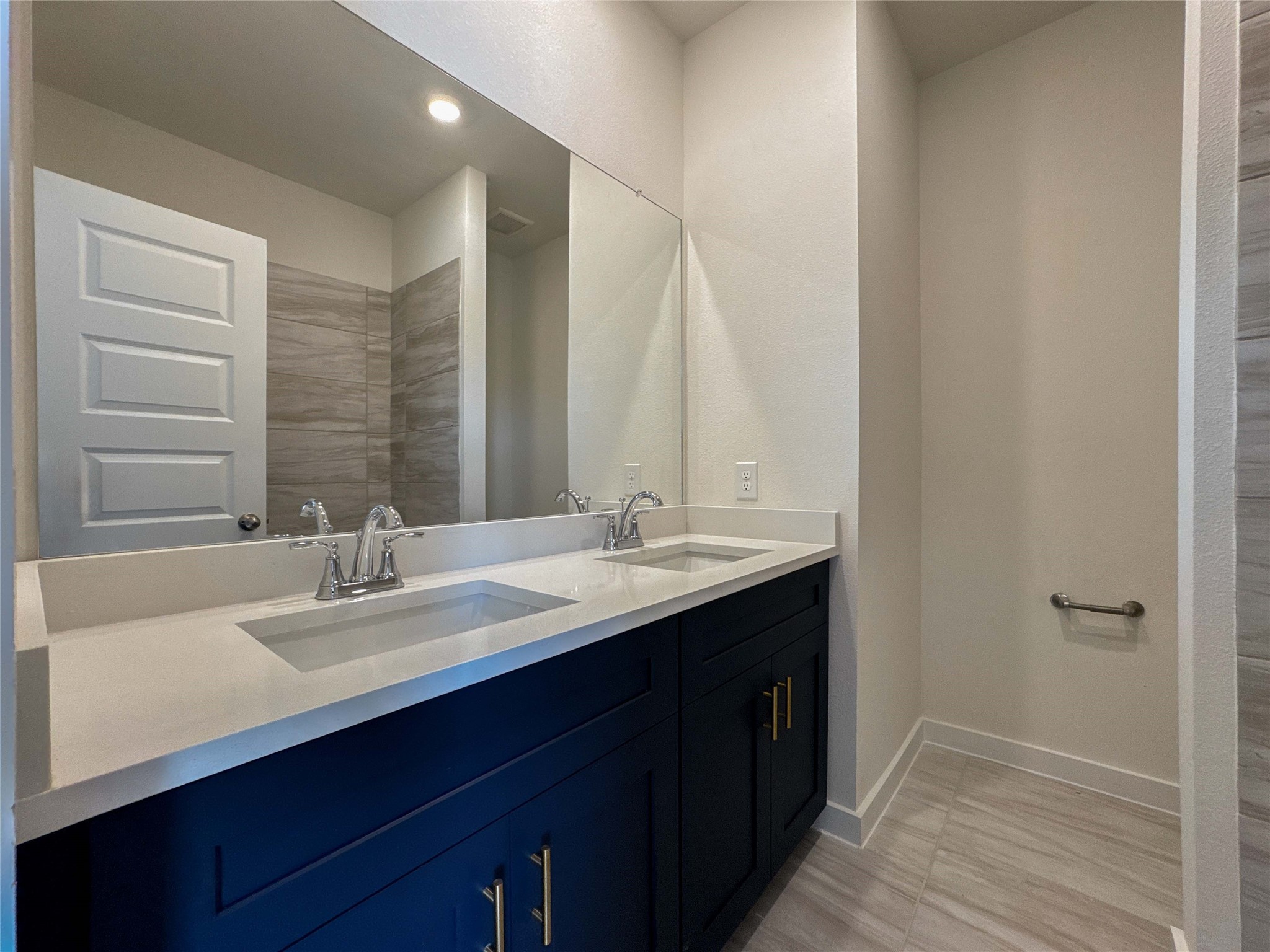 1115 Santee Court Rosharon, TX 77583 - Photo 19 of 24 a bathroom with a double vanity sink and a mirror