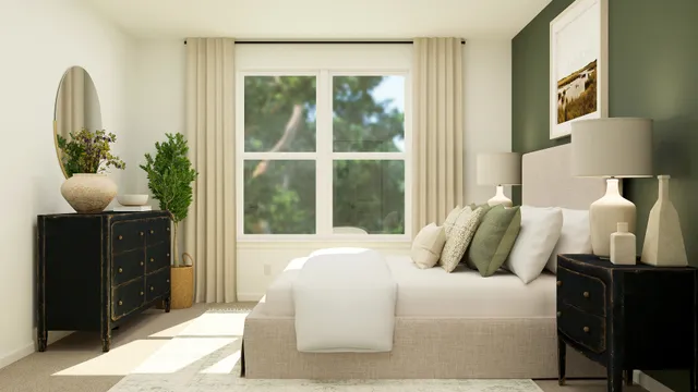 a bedroom with a bed and a potted plant