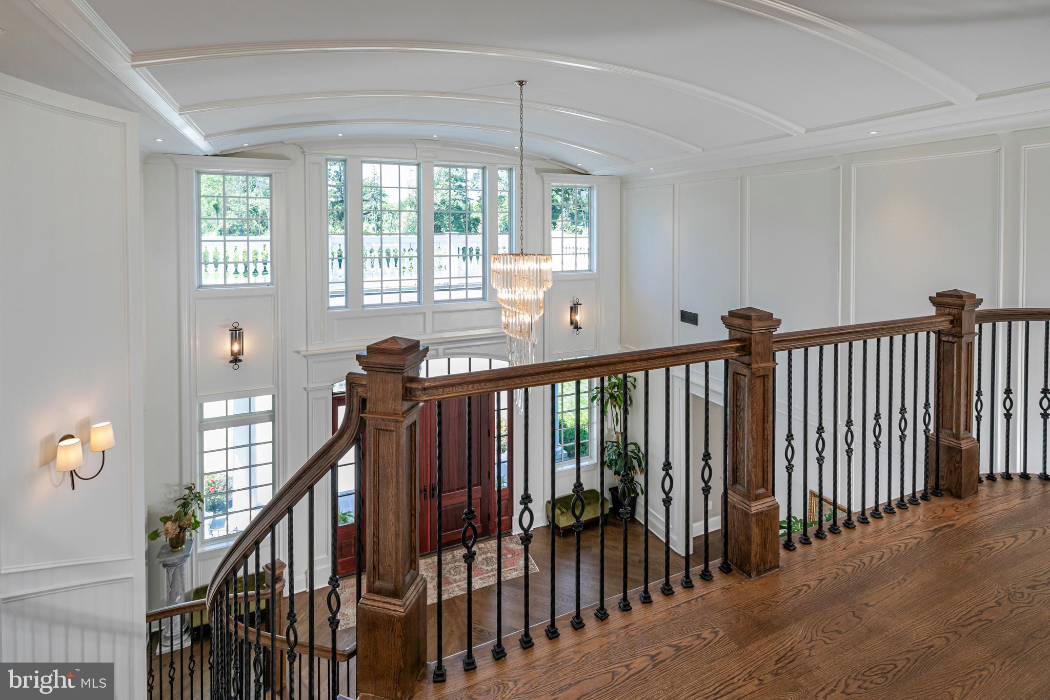 280 Carter Road Princeton, NJ 08540 - Photo 29 of 79 a view of a hallway with wooden floor and stairs